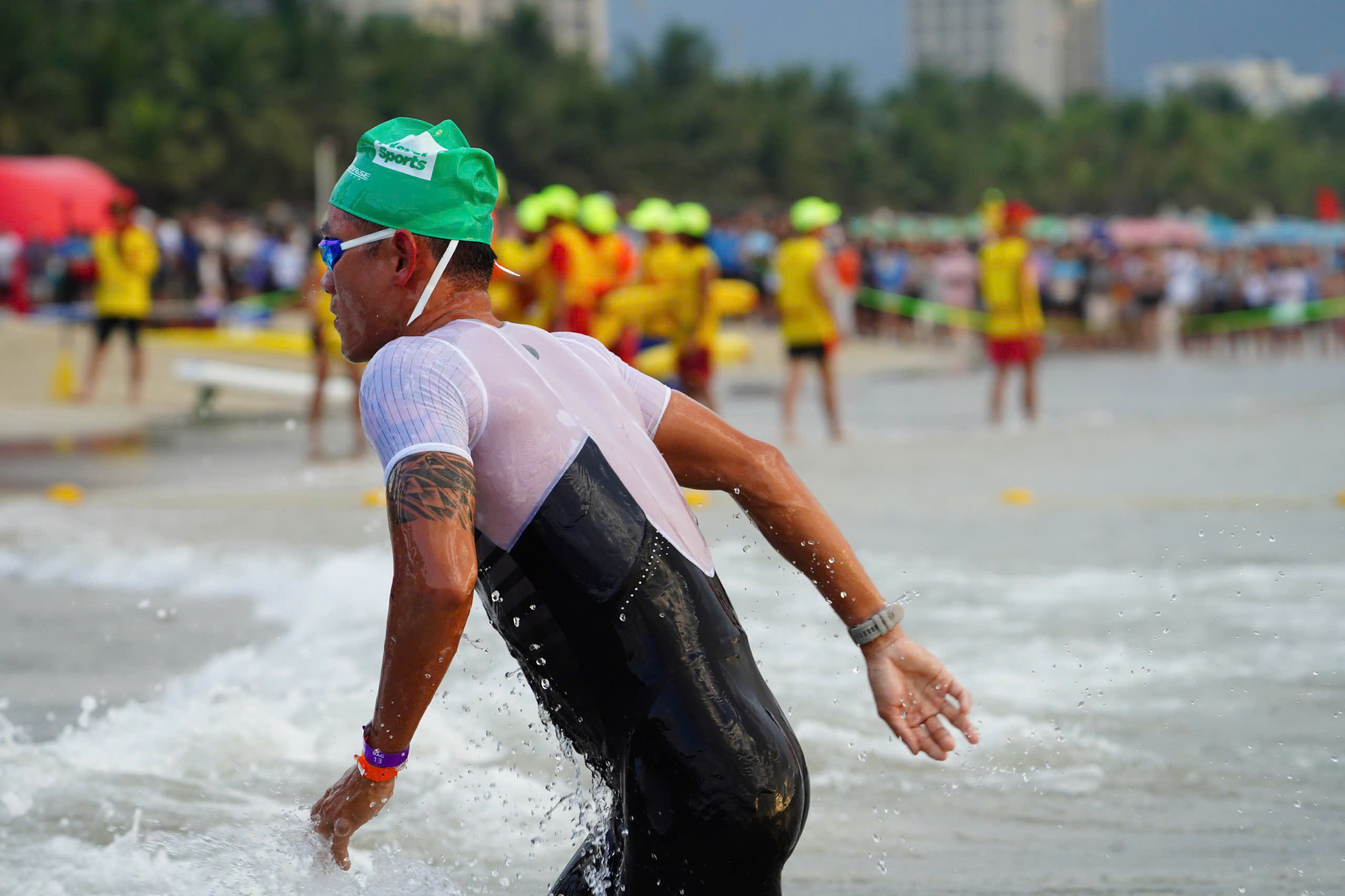 Out of the water and onto the beach — first AG male to T1